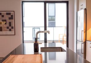 Køkken eller tekøkken på Stuning penthouse old montreal