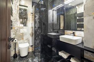 Koupelna v ubytování Ultra Central Luxy Studio + 6 fotografií