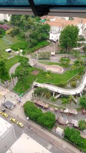 an aerial view of a park in a city at Apartamento Metrô Carioca - Centro Rio in Rio de Janeiro