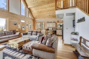 a living room with a couch and a table at Beautiful Peak 7 Private Home in Breckenridge