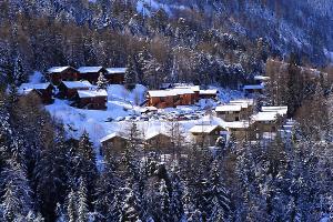 an aerial view of a ski lodge in the snow at Les Chalets Petit Bonheur - LES CHALETS PETIT BONHEUR - CHT84 MAE-2504 in Villarodin-Bourget