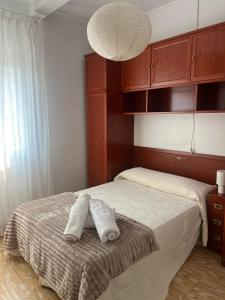 Ένα ή περισσότερα κρεβάτια σε δωμάτιο στο Casa das Pasadiñas-Burela +18 φωτογραφίες