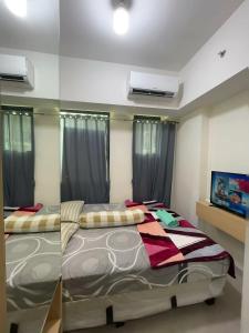 Ένα ή περισσότερα κρεβάτια σε δωμάτιο στο Osaka reverview Apartment PIK 2