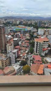 an aerial view of a city with buildings at El departamento de Verito in Cochabamba +9 photos