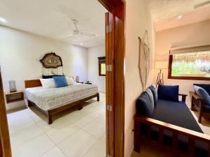 Postel nebo postele na pokoji v ubytování La Selva Apartments Tulum