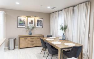 a dining room with a table and chairs at Sequoia Oasis near Downtown Exeter in Exeter +3 photos