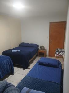 Giường trong phòng chung tại Fronteiras Hostel - Unidade II - Vila Portes +22 ảnh