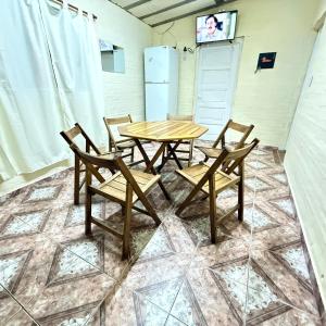 Una televisión o centro de entretenimiento en Casita
