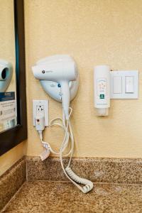a hair dryer on a wall in a room at Quality Inn Ukiah in Ukiah