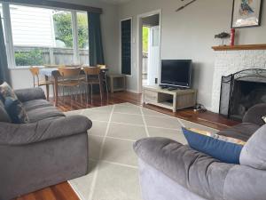 TV a/nebo společenská místnost v ubytování Bach 70