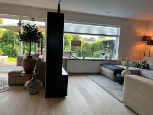 Φωτογραφία από το άλμπουμ του Countryside view bungalow near dunes σε Sint Maartensvlotbrug +30 φωτογραφίες