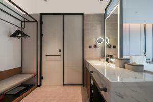 Ένα μπάνιο στο Atour Hotel Hangzhou Xiaoshan Information Port Town