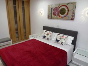 Ένα ή περισσότερα κρεβάτια σε δωμάτιο στο Fantastic Apartment On The Beach +40 φωτογραφίες