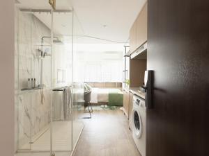 Foto sihtkohas Shenzhen asuva majutusasutuse 城家深圳体育中心红岭北地铁站公寓酒店 galeriist