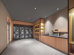 Kuchyň nebo kuchyňský kout v ubytování Atour Hotel Xi'an Jiaotong University Changle Park Subway Station