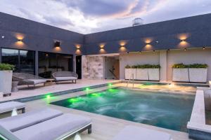 a swimming pool in the middle of a house at Faranda Collection Cúcuta in Cúcuta