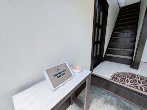 Una cama o camas en una habitación de ''内装フルリフォーム''一棟貸し l 千歳空港まで30分 l HOKKAIDO l 椴松Todomatsu