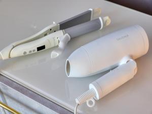 two wii controllers sitting on top of a table at Mt,Fuji Glamping Terrace Minenohana - Vacation STAY 35712v in Oishi