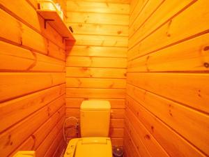a bathroom with a yellow toilet in a wooden room at Nasu-gun - House - Vacation STAY 13478 in Anazawa +20 photos