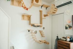 a room with wooden shelves on the wall at Designer's apartment polaris 102 - Vacation STAY 13315 in Nagoya