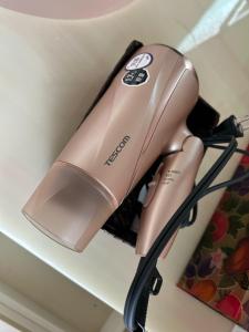 a hair dryer hanging on a wall at Cool Villa Hida Resort - Vacation STAY 16761v in Hida