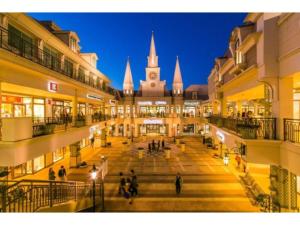a view of a shopping mall with a clock tower at Mugi no oyado - Vacation STAY 13498 in Kuwana