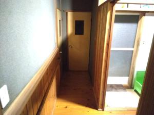 a hallway leading to a door in a room at Lourde no yado bekkan Kawakami-tei - Vacation STAY 13526 in Amakusa