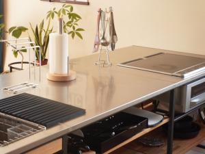 a kitchen counter with a sink and a stove top oven at Goto - House - Vacation STAY 43273v in Goto
