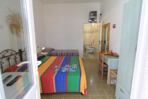 Postel nebo postele na pokoji v ubytování B&B Monterossi