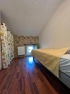 Postel nebo postele na pokoji v ubytování Maison pleine de charme à 100m de la plage