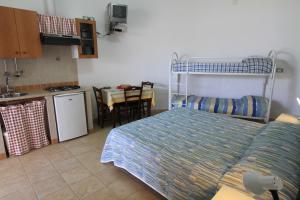 Postel nebo postele na pokoji v ubytování B&B Monterossi