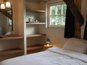 מיטה או מיטות בחדר ב-Rest & Rust