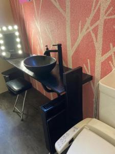 a bathroom with a sink and a toilet at TRAX NUNOBA - Vacation STAY 02612v in Yuzawa +15 photos