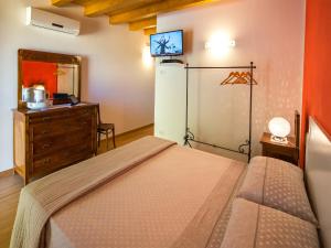 Postel nebo postele na pokoji v ubytování B&B La Rubiana