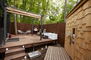 a wooden deck with a sink and a fence at TinyCabinTATEGU#02 - Vacation STAY 20575v in Oiwake