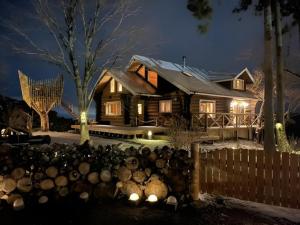 a wooden house with a fence in front of it at Renesto aHOLIDAYHOME - Vacation STAY 27984v in Kobe