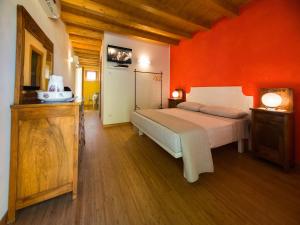 Postel nebo postele na pokoji v ubytování B&B La Rubiana