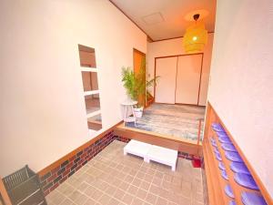 an empty room with two chairs and a table at Marina HOUSE Onjuku - Vacation STAY 14125 in Iwada +39 photos