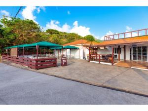 a building with a picnic shelter in front of it at Nagura Village - Vacation STAY 61123v in Kabira
