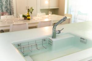 a kitchen sink with a faucet in a kitchen at Takashima - House - Vacation STAY 14172 in Takashima +32 photos