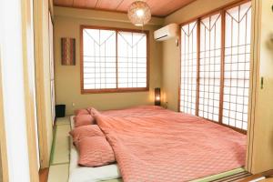 Postel nebo postele na pokoji v ubytování Maison Tsunami - Vacation STAY 79591v