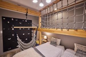 Un pat sau paturi într-o cameră la Villa Hanasaku Karuizawa Miyota - Vacation STAY 14347v