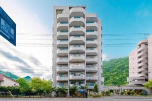 a tall building with balconies on the side of it at Lions Mansion Sanbankan Room 602 - Vacation STAY 14372 in Jozankei