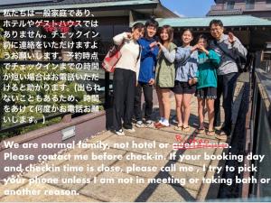 a group of people standing in front of a sign at ichihara homestay-stay with Japanese family - Vacation STAY 17885 in Ichihara