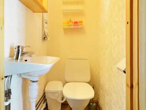 a small bathroom with a toilet and a sink at 4 person holiday home in Mönsterås-By Traum in Mönsterås