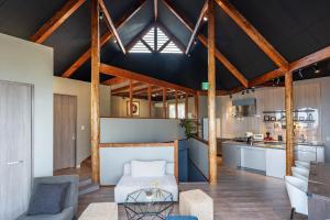 a living room with a couch and a table at Goshikihama Villa - Vacation STAY 36099v in Sumoto