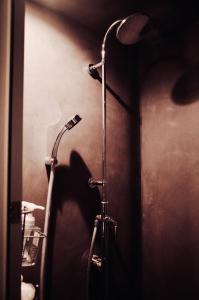 a shower in a bathroom with a shower head at MAGATAMA,INN - Vacation STAY 41790v in Sumoto