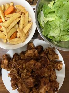 three bowls of food with french fries and lettuce at ichihara homestay-stay with Japanese family - Vacation STAY 15786 in Ichihara