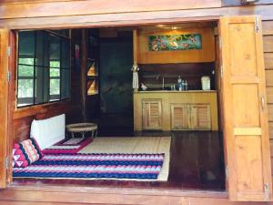 an inside view of a kitchen in a house at Chiang Dao Hut in Ban Tham