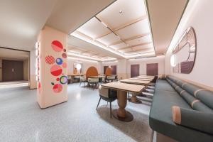 Χώρος καθιστικού στο Orange Hotel Beijing West Railway Station South Square